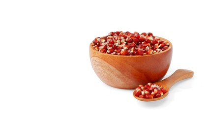 Red corn in wooden bowl and wooden spoon isolated on white background