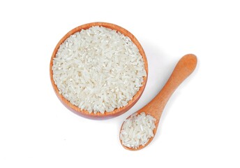 Rice with wooden bowl and wooden spoon isolated on white background,Top view
