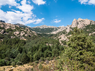 Panoramic view of La Pedriza on the southern slope of the Sierra de Guadarrama in the community of Madrid. Spectacular orography composed of mountains and cliffs created with this peculiar stone