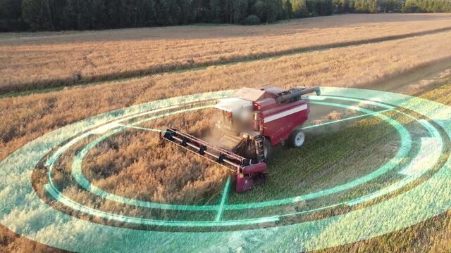  Animation of self driving, autonomous farm agricultural combine harvester working in field. Harvesting vehicle future concept with HUD elements. Aerial view.