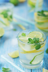 Glasses with lemon and lime lemonade
