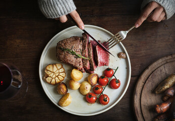 Close up of a cutting a fillet steak food photography recipe idea