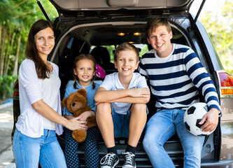 Happy family on a road trip