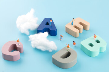Elementary school students and English letters in a miniature world