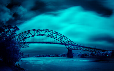 Dramatic Blue Night Cloudscape over Bourne Bridge on Cape Cod in Massachusetts