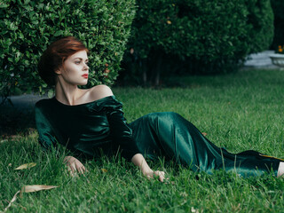 attractive woman lies in gothic garden celebrated summer