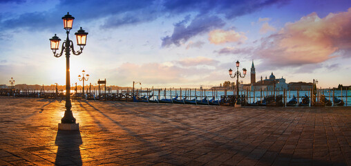 San Marco with the curch San Giorgio di Maggiore in the background in Venice, Italy at a beautiful sunrise