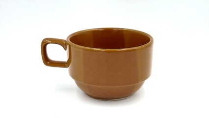 brown ceramic cup on isolated white