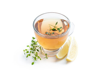Green tea with lemon balm herb in glass cup isolated on white
