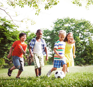 Cute Diverse Kids Playing In The Park