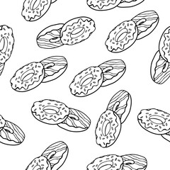 Seamless pattern of donuts in frosting on a white background.The vector pattern can be used in textiles, packaging, and menus.
