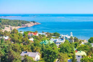 Fototapeta na wymiar Hanko, Southern Finland. High angle view of an old Finnish town. Baltic sea coastline, blue water. Seascape. Finnish landscape at summer, traditional architecture from above. Townscape Gulf of Finland