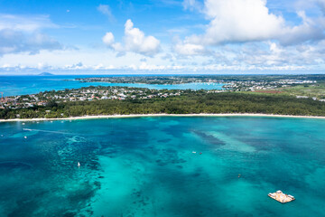 Aerial view, beaches with luxury hotels with water sports at Trou-aux-Biches Pamplemousses Region, behind Grand Baie, Mauritius, Africa