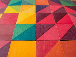 colored woode cubes forming a texture - close up