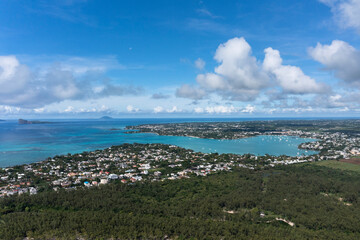 Fototapeta na wymiar Aerial view, beaches with luxury hotels with water sports at Trou-aux-Biches Pamplemousses Region, behind Grand Baie, Mauritius, Africa