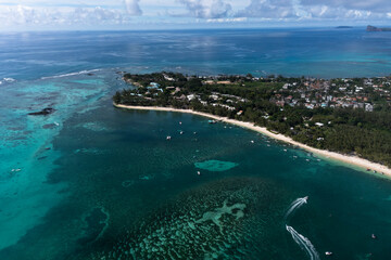 Aerial view, beaches with luxury hotels with water sports at Trou-aux-Biches Pamplemousses Region, behind Grand Baie, Mauritius, Africa