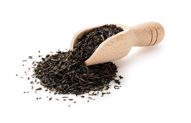 Wooden scoop with tea leaves on white background