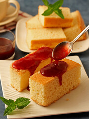 Sponge cake with strawberry jam.
