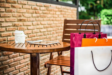 Shopping bags on an outdoor cafe
