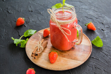 Healthy smoothie of fresh summer berries. Creative atmospheric decoration