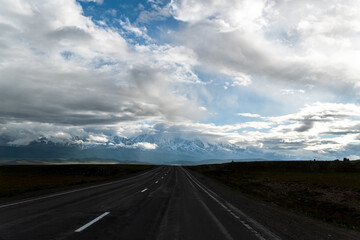 road, mountains, clouds and sky