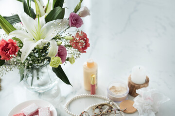 Woman cosmetics on marble table