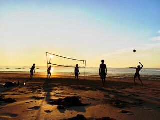 Beach volley at sunset