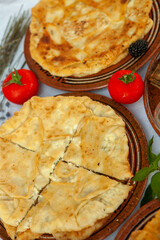 Traditional fried pies from Romania with potatoes, cheese and cabbage. Romanian food.