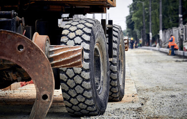 Excavator on a heavy construction road site.