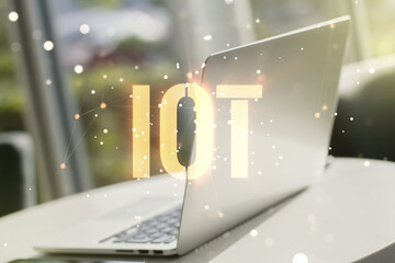 Creative IOT concept on modern laptop background. Multiexposure