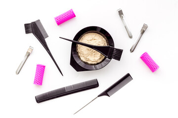 Naklejka premium Hairdresser equipment for hair dye with brush and mixing bowl