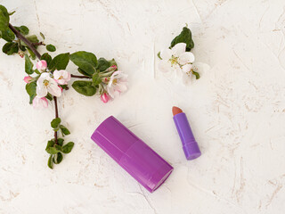 Women's accessories and flowers on a white background.