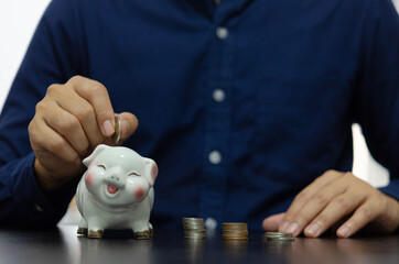 Finance concept business, collecting money for retirement or investing or sharing expenses. Drop a...