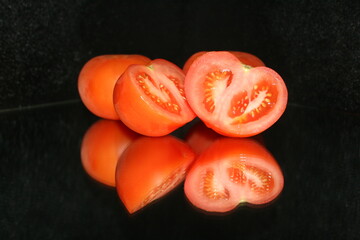 tomato on a black background