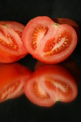 tomato on a black background