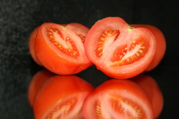 tomato on a black background