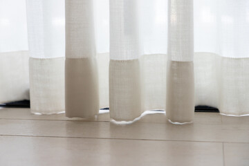 white transparant curtain. calico curtain decoration in bedroom.