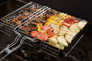 vegetables are cooked on a grill