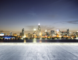 Empty concrete dirty quay on the background of a beautiful blurry Chicago city skyline at night, mockup
