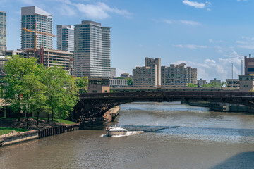 Several skyscrapers on the embankment of South Branch Chicago river and a bridge