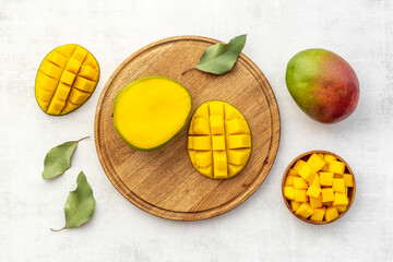 Mango fruit slices and cubes. Tropical fruits layout