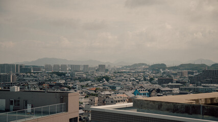 Time clouds over city, Japan