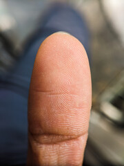 Fingerprints on thumbs taken with a macro lens