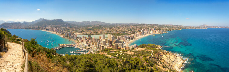 Aerial panorama of the Costa Blanca. Panoramic view of Calpe from famous rock - Penon de Ifach, overlooking the coast, the harbor, lake and the city.. © leesle