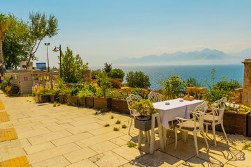 ANTALYA, TURKEY: Beautiful top view of the cafe, the Mediterranean Sea and the mountains in Antalya.