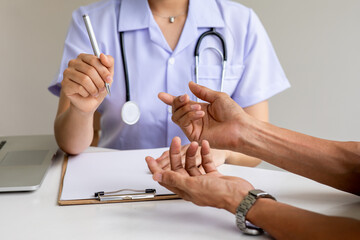 Close up of patient and doctor ,Hand of doctor reassuring patient,Medical ethics and trust concept,...