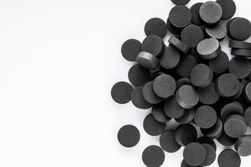 activated carbon on a white acrylic background
