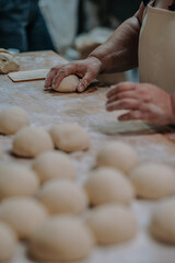 hands kneading dough