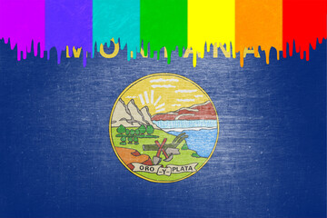 Paint (rainbow flag) is dripping over the state flag of Montana