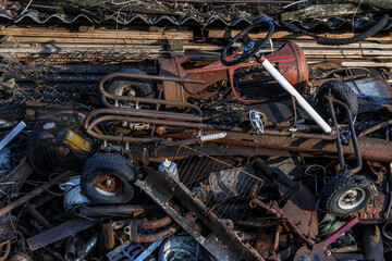 Scrap metal waste is stored in a recycling yard